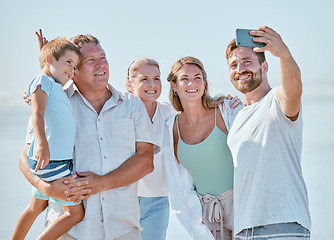 Image showing Love, beach and phone selfie of happy family in outdoor nature for peace, freedom and bonding quality time. Picture memory, summer holiday and big family of parents, grandparents and child in Canada