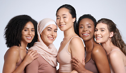 Image showing Diversity, woman and beauty portrait for body positive support, happiness and skincare wellness. Interracial models, happiness solidarity and smile for skin glow, cosmetics dermatology in studio