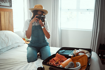 Image showing Woman, photographer or camera picture of suitcase for summer holiday, vacation break or content marketing for creator blog. Travel influencer, digital photography or luggage objects in hotel bedroom