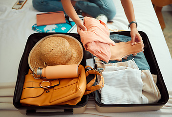 Image showing Hands, woman and suitcase on a bed for travel, adventure and summer vacation, packing and clothing. Hand, girl and luggage in a bedroom for travelling, abroad and break, relax and getaway preparation