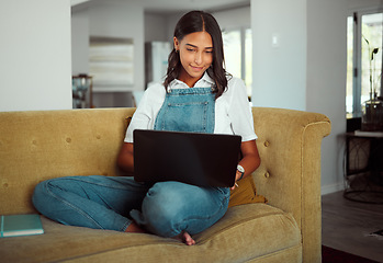 Image showing Woman, laptop or relax on sofa in house or home living room for e learning, education or lockdown study. Smile, happy or student on technology for university homework, college or school scholarship