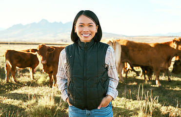 Image showing Cow, farmer and asian woman on field in nature for meat, beef or cattle food industry in Japan. Portrait happy female farming livestock, cows and agriculture animals, milk production and management