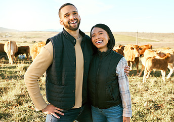 Image showing Portrait, farm and couple on cattle farm, smile and happy for farming success, agro and agriculture. Farmer, man and woman hug on grass field with livestock, excited for sustainability business