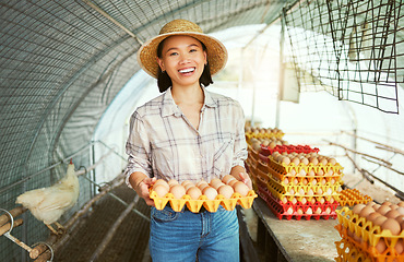 Image showing Asian farmer woman, portrait and egg production for organic small business, sustainability and smile. Happy chicken farming expert, success and vision with agriculture goals in countryside with eggs