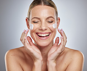 Image showing Skincare, face cream and woman in studio for beauty, wellness and grooming on grey background mockup. Facial, sunscreen and girl face model relax with luxury skin product, happy with mask treatment