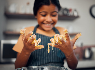 Image showing Girl, hands and dough while learning cooking in home kitchen. Baking, education and happy child chef with bowl and flour mixture, smiling and having fun while preparing delicious pastry in house.