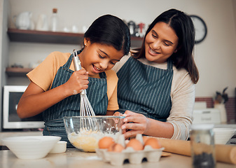 Image showing Bakery, baking and woman with girl learning to bake, cooking skill and development with happiness and help. Mother, child with fun activity and teaching to learn with food ingredients in family home.