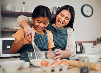 Image showing Mom, kid and baking in kitchen, family home and house for childhood fun, learning or development. Mother and daughter cooking, teaching and mixing ingredients in bowl to bake dessert, flour and whisk