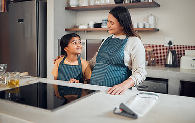 Image showing Cooking, happy and mother and girl in kitchen for food, bonding or pregnancy. Help, learning and breakfast with pregnant woman baking with daughter for support, preparation or teaching in family home