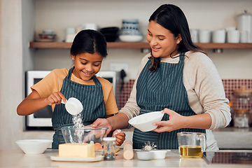 Image showing Mother, girl and learning cooking in kitchen, bonding or having fun. Love, care and happy mama teaching kid chef baking, mixing flour in bowl and smiling while enjoying quality time together in house