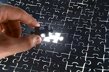 Image showing Assembling the puzzle