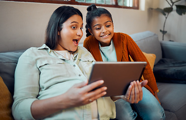 Image showing Tablet, pregnant mother and girl on technology looking at children education development app. Learning video, relax and happy family together on a home living room sofa watching a cartoon with mama