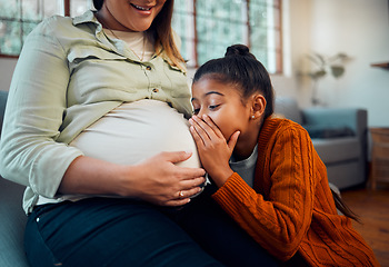 Image showing Pregnant, children and stomach with a mother and daughter whispering to a sibling in a belly at home. Whisper, love and kids with a girl talking to her unborn sister in the tummy of a woman