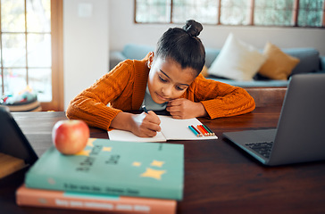 Image showing Education, home school and distance learning with a student girl writing in her book during an online class. Laptop, study and kids with a female pupil or child learner in her house for development