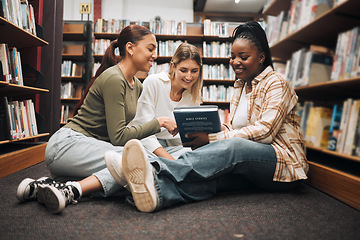 Image showing Books, education and friends on a library floor for learning, research and homework assignment, happy and excited. Campus, women and university students bond on ground with book for exam preparation