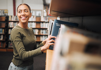 Image showing Student woman, search bookshelf and library for study, research and knowledge at university. College student, information and studying for education, college and learning for scholarship in Atlanta