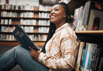 Image showing Black woman student, reading or library floor for religion, study or bible in research, focus or learning. African college student, christian education or studying god book for knowledge in Chicago