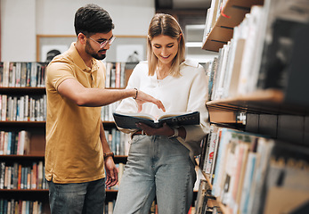 Image showing Students, library and discussion for man, woman or book for knowledge, learning or information in university. Bookshelf, conversation and reading for college student, friends or education for success