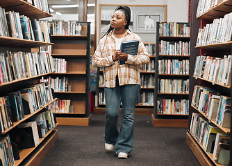 Image showing Search, university or black woman in a library for books, educational knowledge or research on a college campus. Scholarship, future or African school student walking or shopping in retail book store