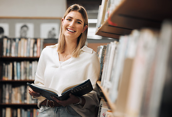 Image showing Student, reading or books in library on school, university or college campus for education, study research or learning. Portrait, smile or happy woman, textbook or bookshelf information for homework