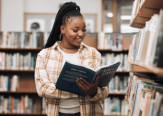 Image showing Black woman, library and reading for knowledge, education and relax. Nigerian female, girl and student read book, bookstore and research for task, smile and enjoy free time with literature and study.
