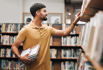 Image showing Student man, search bookshelf and library for reading, information and knowledge at university. College student, research and studying for education, college and learning for scholarship in Marseille