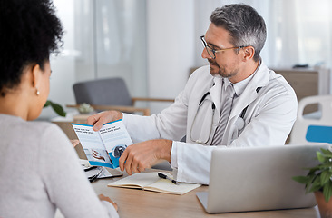 Image showing Consulting, brochure and help with doctor and woman in office for life insurance, medical and safety. Results, support and advice with patient listening to healthcare worker for learning in checkup