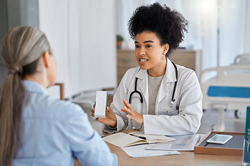 Image showing Doctor, healthcare and consultation for medicine prescription for covid, flu or cold. Wellness, corona and elderly woman consulting black female medical physician for cough mixture in hospital office