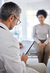 Image showing Doctor, consultation and writing on clipboard with patient in hospital office for symptoms, records or notes. Healthcare, wellness or black woman consulting medical physician with checklist in clinic