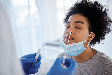 Image showing Covid, health and medical test with black woman, nasal swab and doctor with patient, healthcare and face mask. Sample collection for PCR, diagnosis and health care, covid 19 compliance and safety.