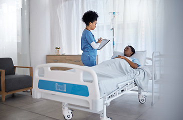 Image showing Nurse, sick patient and hospital consultation for healthcare and medical support with health insurance for stay with checklist for questions and wellness. Woman worker and client in bed for revocery