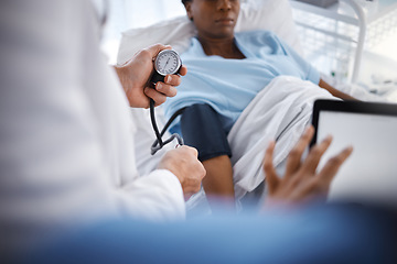 Image showing Blood pressure, hypertension and doctor with patient to check diabetes, healthcare consulting and service in clinic. Closeup of surgeon hands measure arm pulse, test and medical wellness for surgery