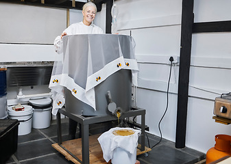 Image showing Beekeeping, honey production and woman with a machine for warehouse working, sustainable work and management of process. Happy, agriculture and portrait of a beekeeper with sweet food in storage