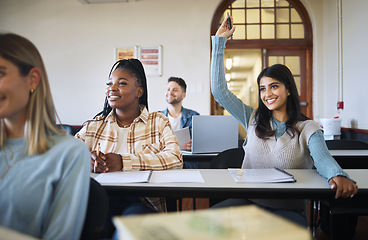 Image showing Question, education and learning with a student woman in a university or college class during a lesson. Classroom, study and scholarship with a female pupil raising her hand during an academy lecture