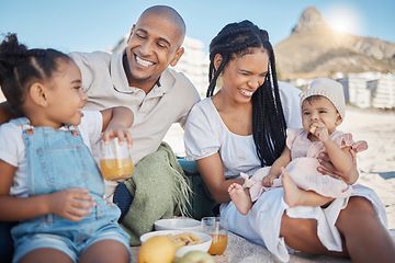 Image showing Black family, happy and food picnic on beach with kids to enjoy summer outing together in Cape Town, South Africa. Children, mother and dad relax on sand in nature for bonding in sunshine.