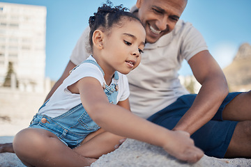 Image showing Beach, father and girl play with sand as a happy family bonding on a fun summer holiday vacation in Brazil. Smile, travel of dad enjoying quality time with a young playful child or kid on beach sand