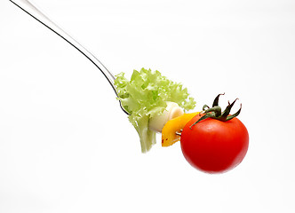 Image showing cherry tomato on fork