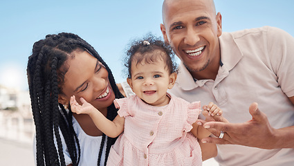 Image showing Happy family, mother and father with a baby at a beach for summer holiday, vacation or weekend in Rio de Janeiro. Relaxing, mom and lovely dad smiles enjoying fun quality time with newborn in Brazil