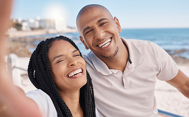 Image showing Holiday selfie, happy and black couple at the beach, honeymoon peace and relax by the ocean in Puerto Rico. Memory, smile and portrait of an excited man and woman with a photo on vacation by the sea