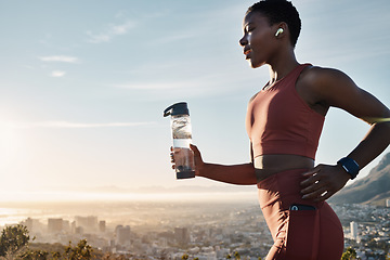 Image showing Black woman, water bottle or earphones in running workout goals, healthcare wellness training or sunset city exercise. Fitness drink, sports athlete or runner listening to motivation radio at sunrise