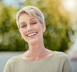 Image showing Senior woman, face and smile outdoor in retirement, environment and freedom in nature in Australia. Portrait, headshot and happy grandma in park for easy lifestyle, healthy mindset or dental wellness