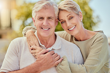 Image showing Portrait, love and retirement with a senior couple hugging outdoor in nature together during summer. Happy, smile and park with an elderly man and woman pensioner bonding outside on a romantic date