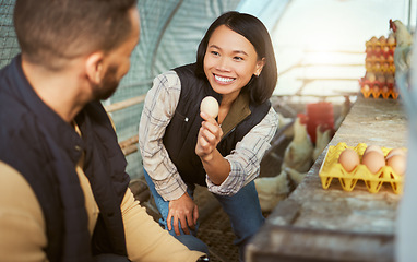 Image showing Asian woman, egg production and chicken farmers check barn, hen house and birds for production, supply chain and food industry. Happy worker, poultry farming and eggs for inspection, growth or export