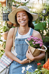 Image showing Flowers, shopping and woman at a nursery with a smile for nature, spring sustainability and growth of plants in a garden. Gardening, ecology and portrait of a happy customer at a floral shop