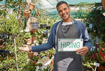 Image showing Plants, garden or manager with a hiring sign at a small business with flowers, nature or growth sustainability. Portrait, job offer or happy business owner with an onboarding banner in gardening shop
