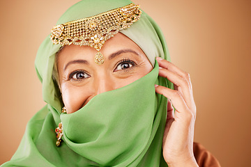 Image showing Muslim woman, face or fashion burka on studio background or traditional jewelry, natural makeup cosmetics or religion jewellery. Zoom portrait, happy or mature Islamic model in Dubai aesthetic pride