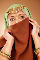 Image showing Muslim woman, face or fashion burka on studio background for Iranian human rights, religion pride or traditional empowerment. Zoom, portrait or islamic beauty model with hijab, scarf or gold jewelry
