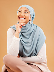 Image showing Muslim, fashion and woman in studio thinking of hijab beauty, makeup ideas and cosmetics with mockup and smile. Happy islamic model with designer fabric, silk and inspiration for Arab culture