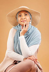 Image showing Fashion, Muslim and senior woman with clothes for culture, stylish retirement and summer style against a brown studio background. Islam, happy and portrait of an elderly model with hijab clothing