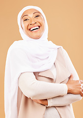 Image showing Laughing muslim woman, arms crossed or fashion hijab on studio background is religion empowerment, traditional pride or Iranian rights success. Portrait, smile or mature Islamic model in trendy scarf